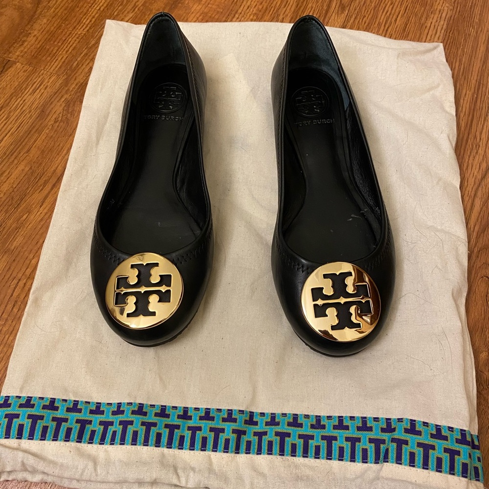 Black Tory Burch ballet flats. No elastic in back.